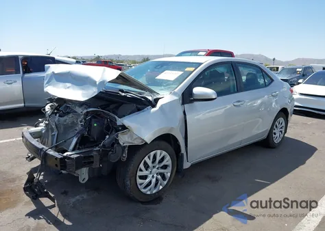 2017 Toyota Corolla Le z USA, uszkodzony, nr VIN 2T1BURHE2HC803055